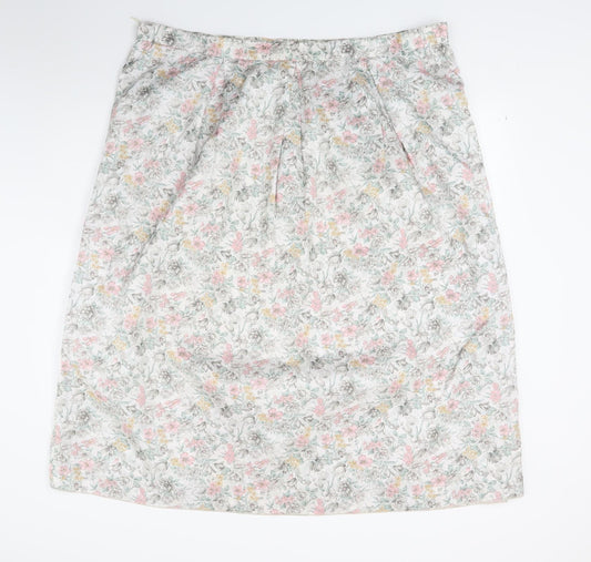 Front view of Preworn women’s white floral a-line skirt, size UK 42, in