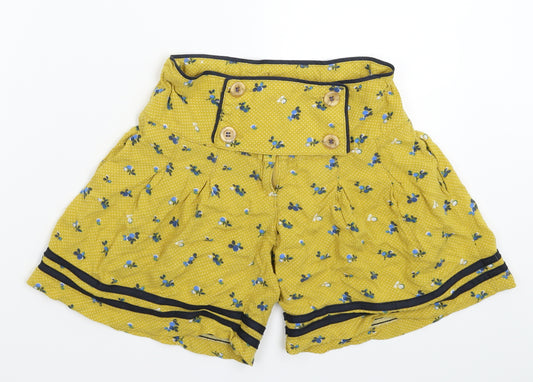 Front view of Next girls’ yellow floral bermuda shorts, size 7, years