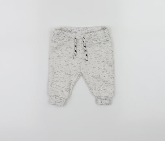 Front view of Primark Baby White Jogger Trousers, size 0-3, Months