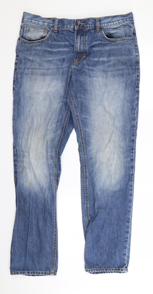 Front view of women’s blue bootcut jeans, size UK 32, 32-inch leg