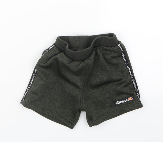 Front view of Ellesse boys’ green cropped trousers, size 12-18, months