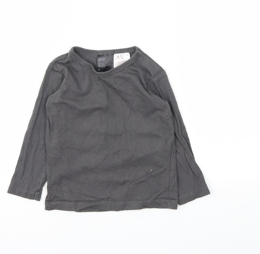 Front view of H&M girls’ grey basic t-shirt, size 9-12, months