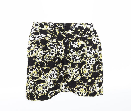 Front view of Topshop women’s black argyle/diamond flare skirt, size UK 8