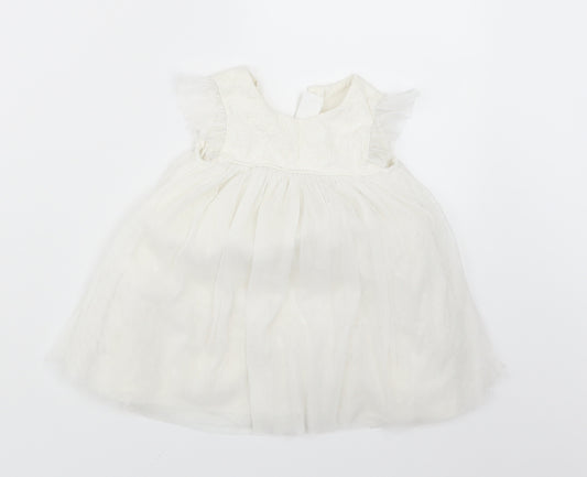 Front view of Next girls’ white shirt dress, size 3-6, months