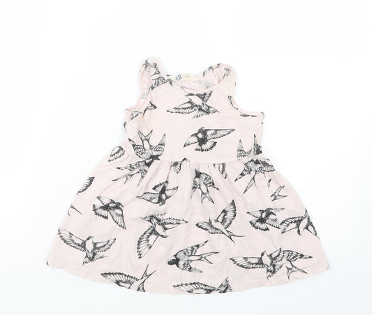 Front view of H&M girls’ pink geometric t-shirt dress, size 2, years