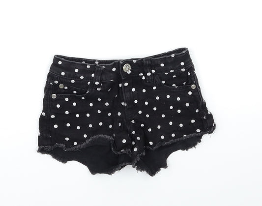 Front view of Marks & Spencer girls’ black polka dot denim hot pants shorts, size 5-6, years
