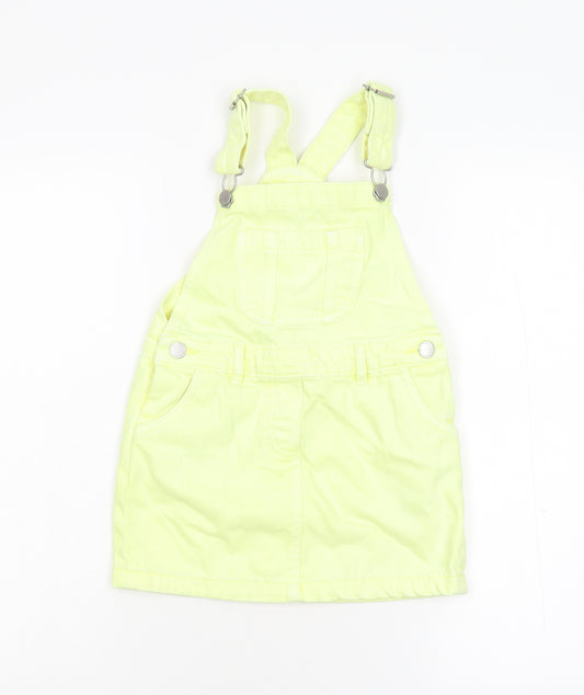 Front view of Next girls’ yellow dungaree one-piece, size 5, years