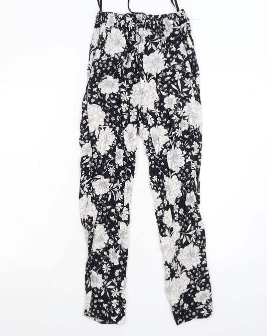 Front view of F&F women’s black floral trousers, size UK 8, 26-inch leg