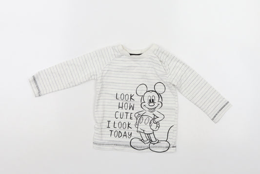 Front view of Disney girls’ white jumper, size 6-9, months