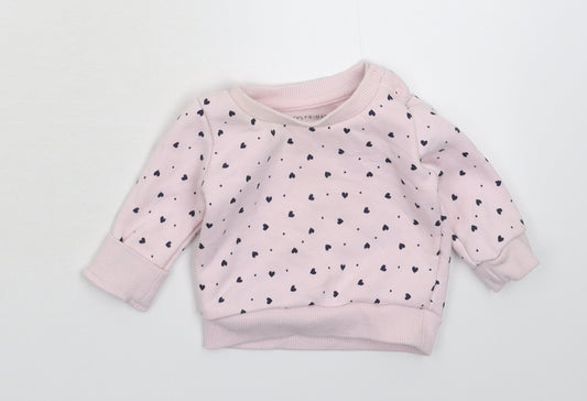 Front view of Primark girls’ pink jumper, size 0-3, months