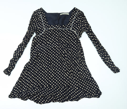 Front view of Next women’s blue polka dot a-line, size UK 12