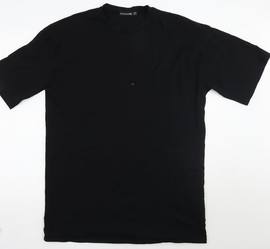 Front view of PRETTYLITTLETHING women’s black basic t-shirt, size UK 12