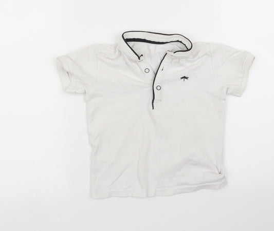 Front view of Matalan boys’ white basic polo, size 3, years