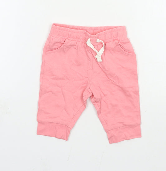 Front view of F&F girls’ pink jersey jogger trousers, size 0-3, months