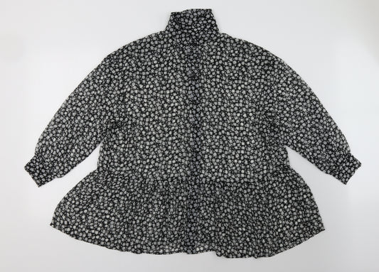 Front view of H&M women’s black floral a-line, size UK 8