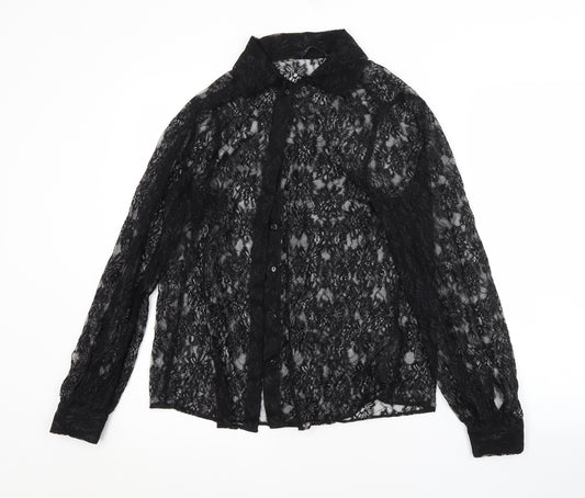 Front view of Marks & Spencer women’s black floral polyamide basic button-up, size UK 12, collared
