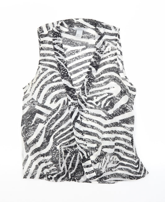 Front view of H&M women’s white animal print polyester tunic button-up, size UK 8, v-neck