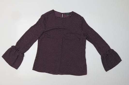 Front view of Primark women’s purple polka dot polyester basic blouse, size UK 12, crew neck