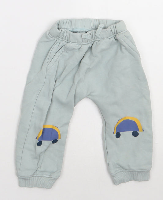 Front view of Marks & Spencer girls’ green cotton jogger trousers, size 12-18, months tie - car