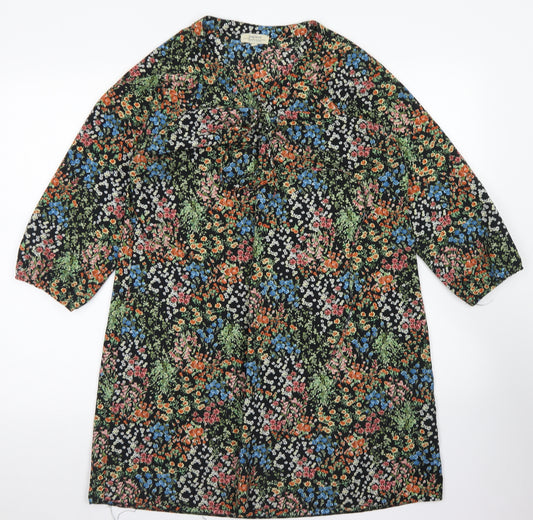 Front view of Papaya women’s black floral polyester a-line, size M, round neck