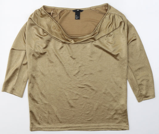 Front view of H&M women’s gold polyester basic blouse, size S, scoop neck