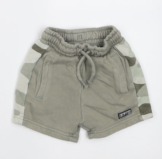 Front view of George boys’ green camouflage cotton cropped trousers, size 12-18, months tie - epic