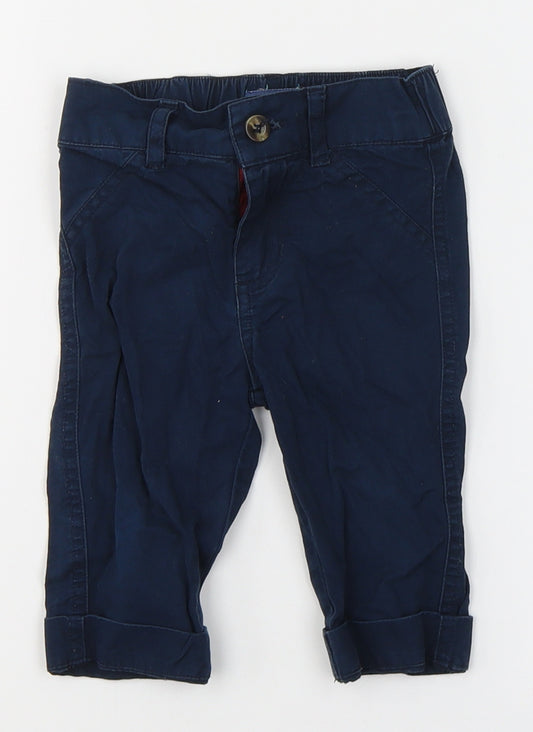 Front view of Andy & Evan boys’ blue cotton capri trousers, size 12-18, months button