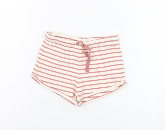 Front view of H&M girls’ ivory striped cotton cropped trousers, size 9-12, months pullover