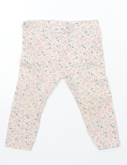 Front view of So Cute girls’ ivory floral cotton jogger trousers, size 18-24, months pullover