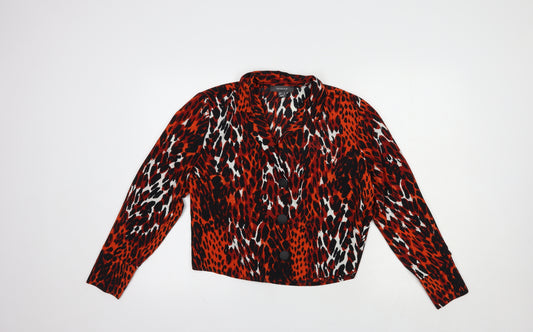 Front view of Primark women’s red animal print polyester basic button-up, size UK 10, collared