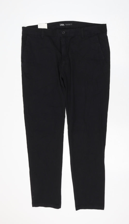 Front view of Zara women’s black cotton trousers, size UK 36, in, 30-inch leg regular zip