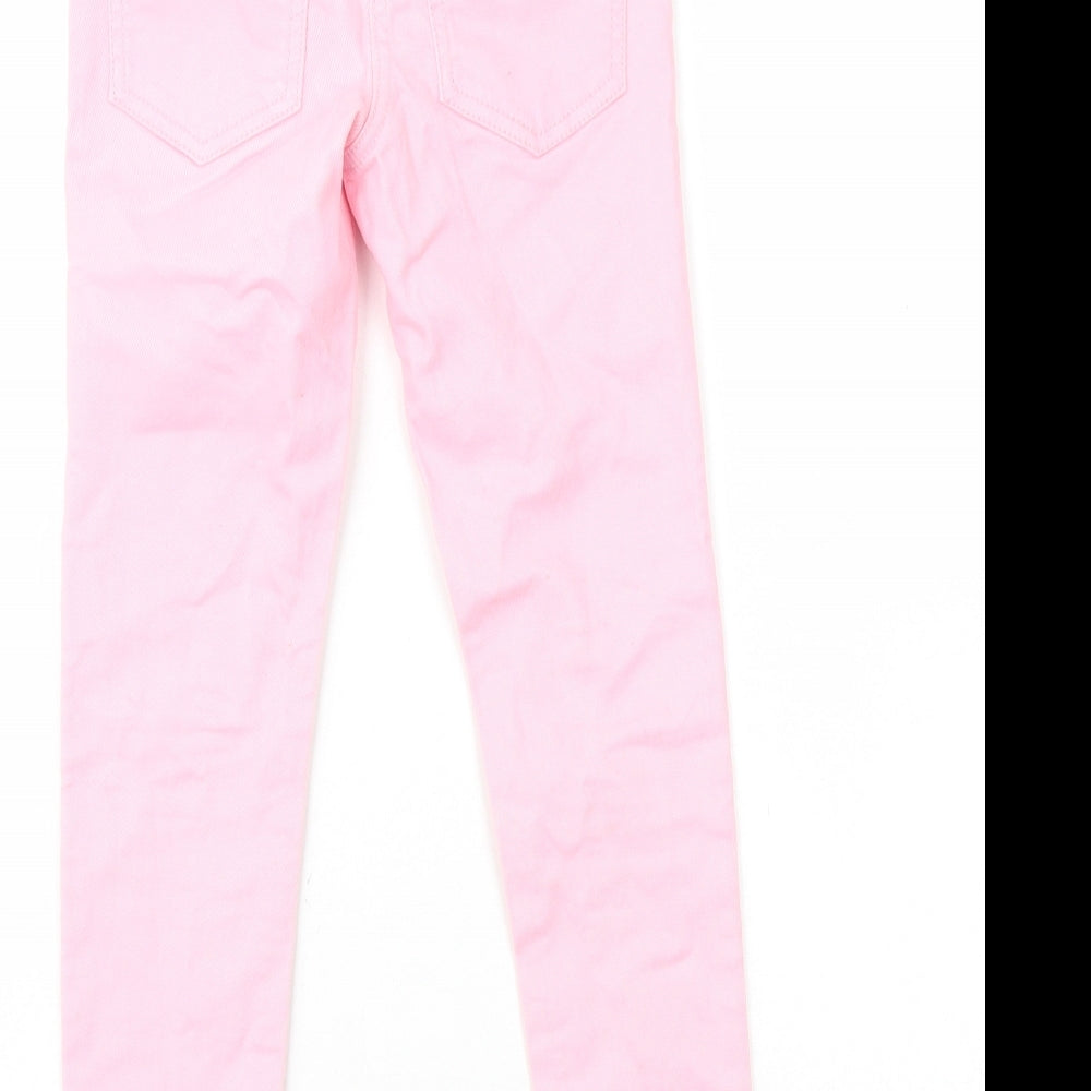 NEXT Girls Pink Cotton Skinny Jeans Size 8 Years L23 in Regular Zip - Knee Rips Pom Pom