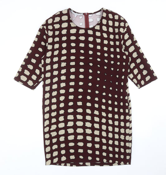 Front view of La Fee Maraboutee women’s red geometric polyester a-line, size UK 10, round neck zip