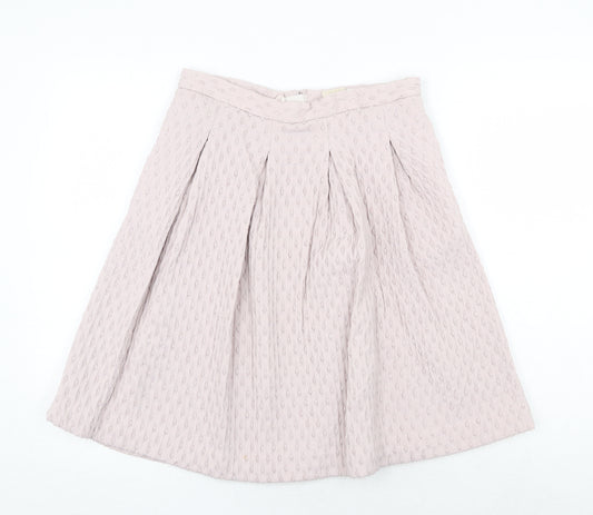 Front view of H&M women’s pink geometric viscose tulip skirt, size UK 12, zip